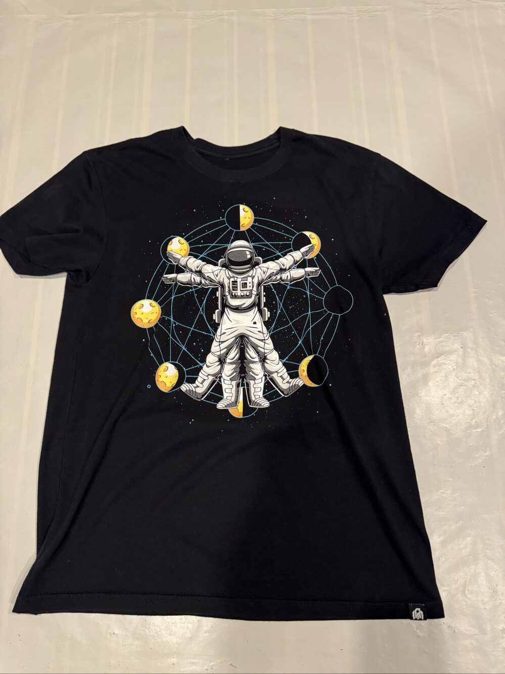 Men’s INTO THE AM Astronaut Moon Phases Space Graphic T-Shirt – Black – Medium